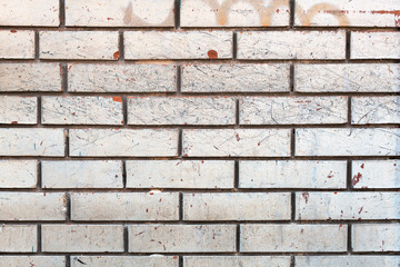 Weathered white brick wall background