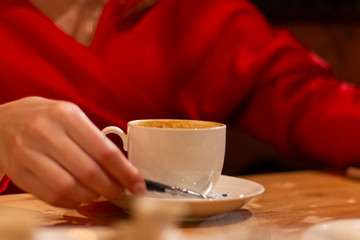 girl is drinking coffee