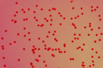 Fototapeta na wymiar Abstract warm red, coral background with red little stars on it, for brochure, invitations. Holidays and new year, christmas conept.