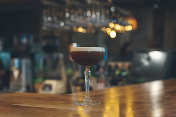 Glass of cocktail on the bar