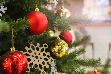 llow balls, snowflake on a Christmas tree. Light corner, background