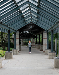 woman running through a japanese park