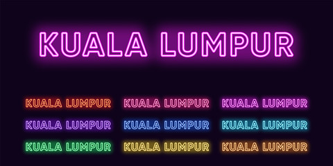 Obraz premium Neon Kuala Lumpur name, capital City in Malaysia. Neon text of Kuala Lumpur city. Vector set of glowing Headlines