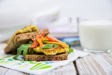 School lunch. Sandwich with vegetables and meat