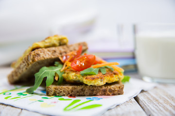 School lunch. Sandwich with vegetables and meat