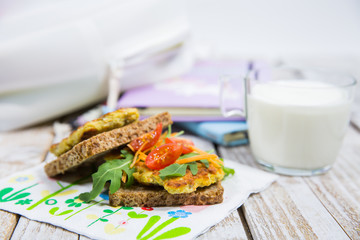 School lunch. Sandwich with vegetables and meat