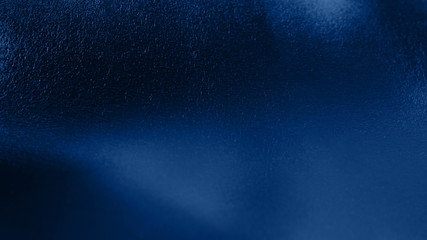 dark blue metal plate. Classic blue color of year 2020