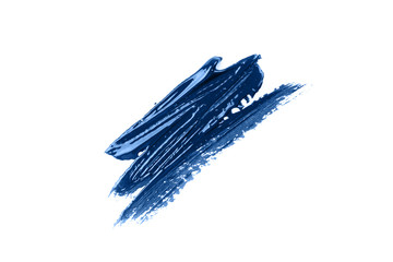 Blue stroke of the paint brush isolated on white. Classic blue color of year 2020