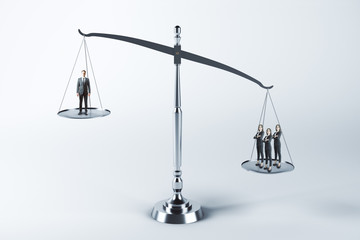 Businesspeople standing on scales