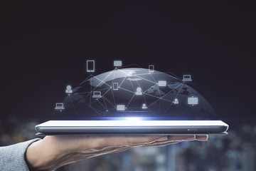 Tablet with glowing social network infograph