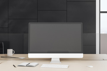 designer desktop with empty computer screen