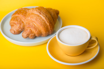 yellow cup on a yellow background