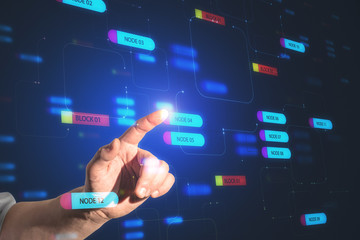 Hand pushing digital screen with node tree signs.