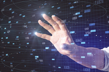 Hand using glowing stock chart