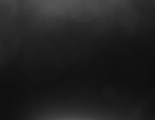 Black-White bokeh from light on a black background