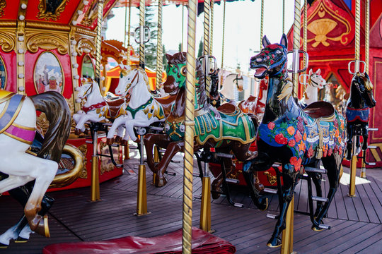 Carousel for children with horses attractions in the Park