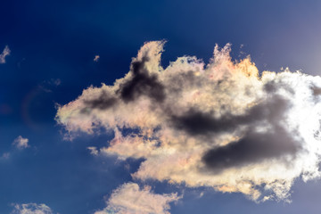 Dramatic puffy fluffy clouds isolated against blue skies
