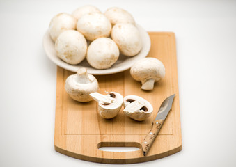 mushrooms on a cutting board