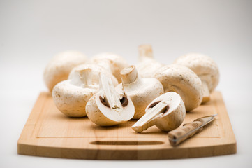 mushrooms on a cutting board