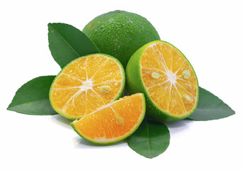 Green orange fruits isolated on white background
