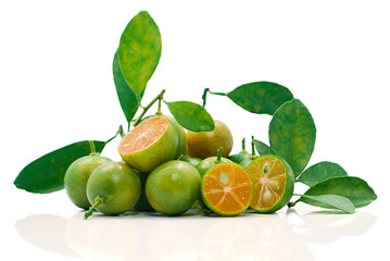 Green orange fruits isolated on white background