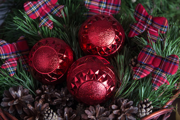 Christmas and new year tree toys with beautiful ribbons on the background of the Christmas tree. New year 2020.
