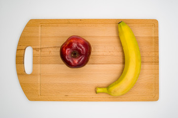 pepper on cutting board isolated on white