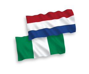 Obraz premium Flags of Nigeria and Netherlands on a white background