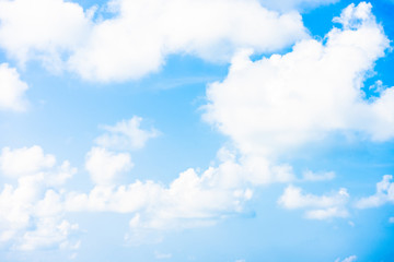 Nature Bright blue Sky with white clouds on blackground. Beautiful sky and clouds in the afternoon.