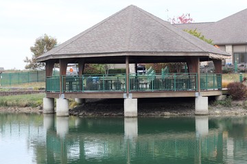 The gazebo at the lake in the park. 