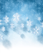 Winter blue background with white paper kirigami snowflakes.