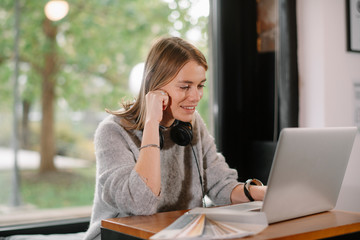 Portrait of young businesswoman working.