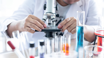 Blur soft images of the Scientist Using a microscope For product inspection In order to achieve the required quality at workplace to science concept. © Anatta_Tan