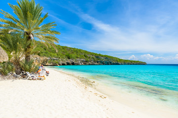 Cas Abao beach - paradise white sand Beach with blue sky and crystal clear blue water in Curacao, Netherlands Antilles, a Caribbean tropical Island