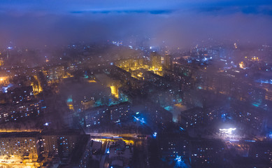 The city Chisinau in winter, at night with lights. Aerial view