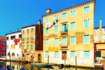 Fototapeta na wymiar Venice, Italy. Traditional canal street with gondolas and boats