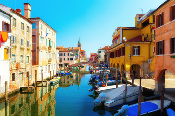 Fototapeta na wymiar Venice, Italy. Traditional canal street with gondolas and boats