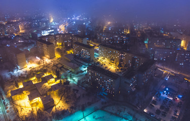 The city Chisinau in winter, at night with lights. Aerial view