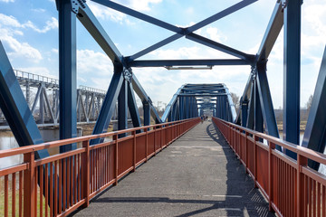 Pedestrian and railway bridges over the river