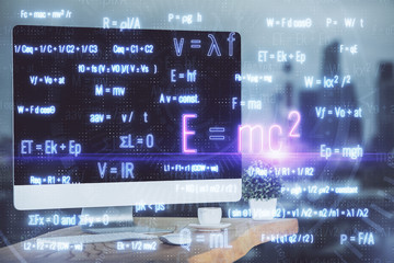 Desktop computer background and formula hologram writing. Double exposure. Education concept.