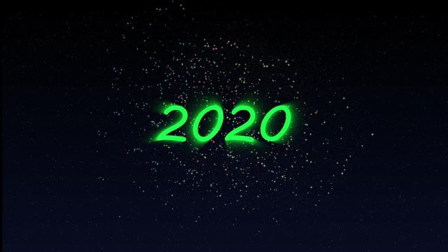 Happy New Year 2020 greeting text with sparkling fireworks illuminate explosion on night star sky background. High-quality best stock abstract footage of Happy New Year 2020. Beautiful typography