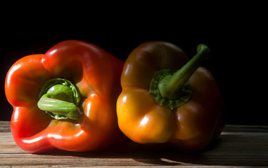 red peppers on black background