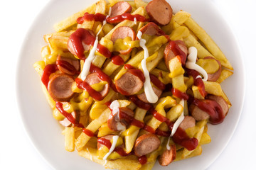 Typical Latin America Salchipapa. Sausages with fries, ketchup, mustard and mayo isolated on white background. Top view	