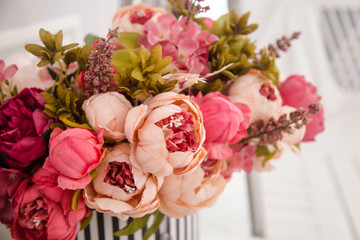pink peony flowers in a vase