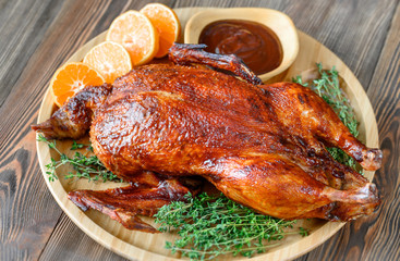 Baked duck on wooden tray