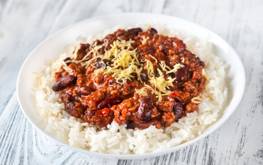 Chili con carne served with white rice