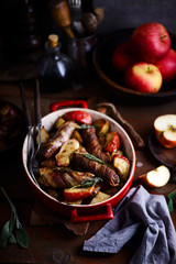 Sausage, apple and potato one-pan roast.style rustic