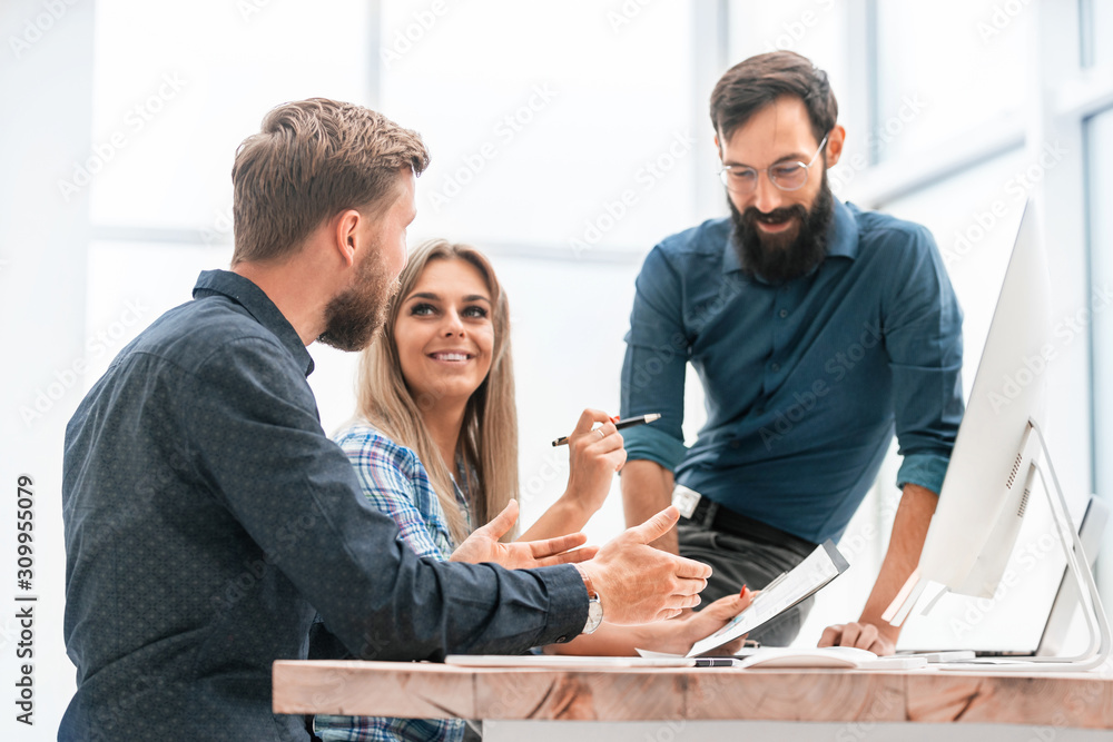 Wall mural business team discussing business plan at office meeting