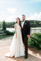 portrait of happy newlyweds in the city Park