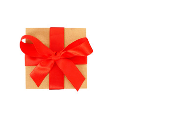 GIft box with red ribbon on white background. Christmas and birthday concept. 